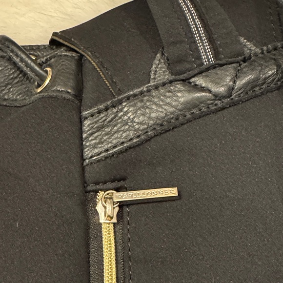 Papillonner Chic Black Backpack with Gold Accents pre-owned. main image 11